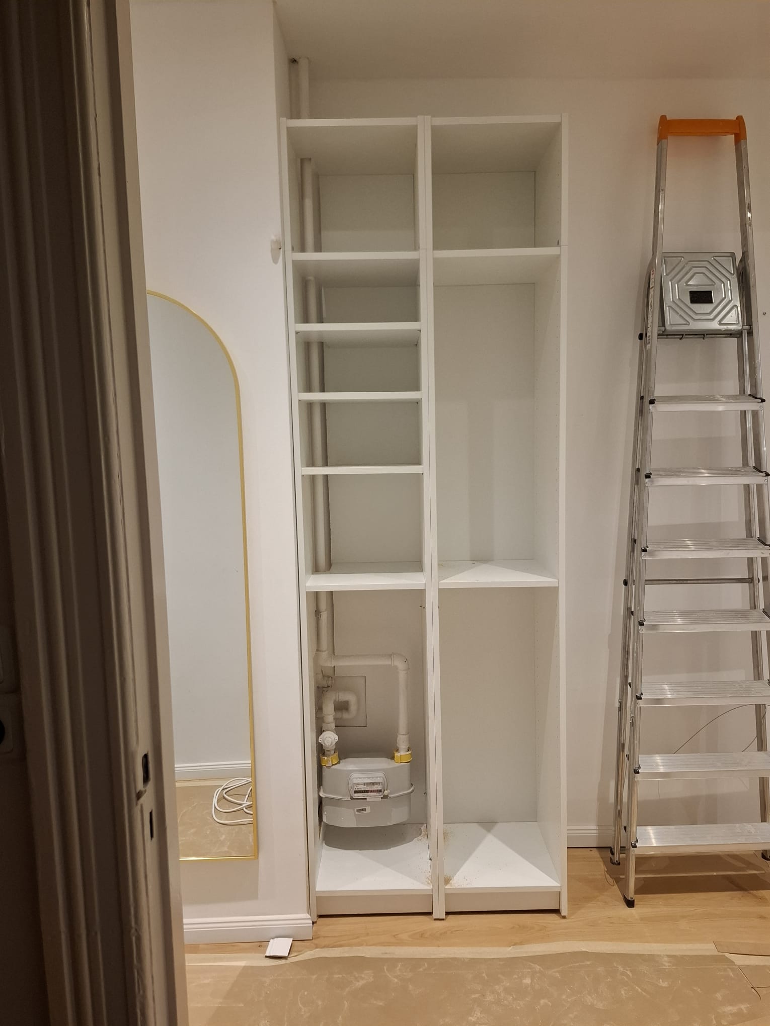 After photo showing the modified IKEA Billy closet installation